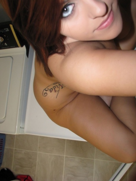 Stunning teen babe Roxy showing off her sexy big boobs in hot self shots