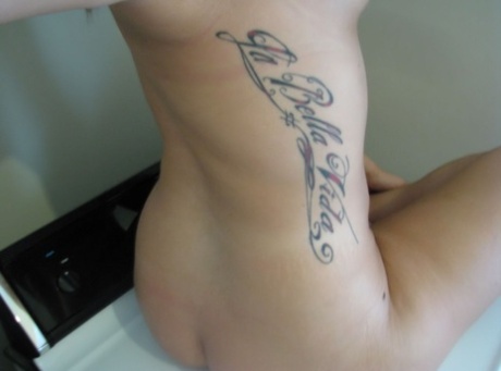 Stunning teen babe Roxy showing off her sexy big boobs in hot self shots