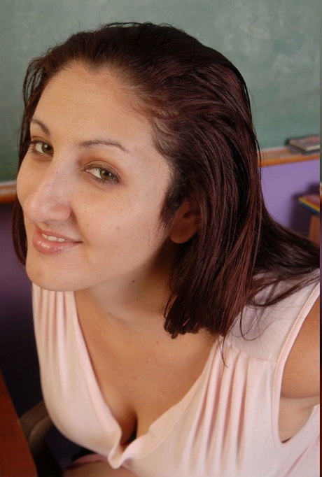 BBW teacher Sonia unveils her big tits & her hairy pussy in a classroom strip