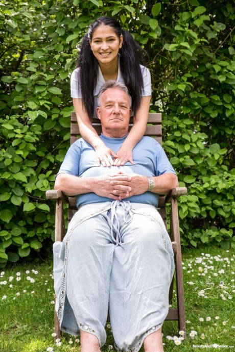 Brunette nurse Ava Black shows her tits & rides a fat old patient outdoors