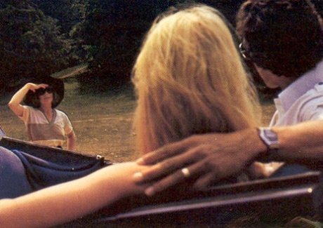Horny girls take a horse ride before sharing a stiff boner in a vintage 3some
