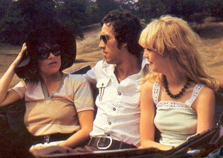 Horny girls take a horse ride before sharing a stiff boner in a vintage 3some