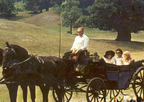 Horny girls take a horse ride before sharing a stiff boner in a vintage 3some