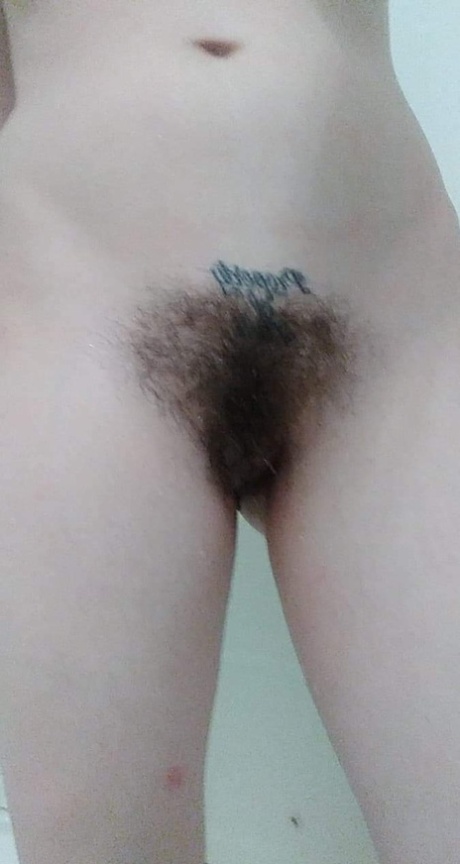 Amateur honey with big tits Amanda Marks teases with her bushy pussy in a tub