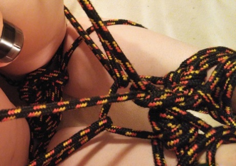 Brunette babe Tiggle Bitties teases with her big tits & gets tied up & toyed