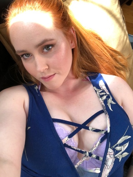Redheaded babe with pierced big tits Alice W shows her ass to a bald dude