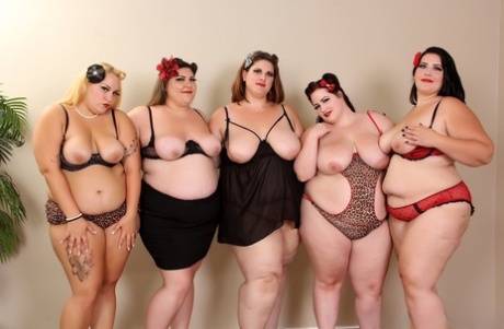 Naughty American BBW models stripping and fucking hard in an orgy
