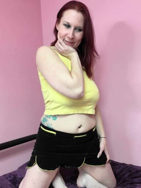 Housewife Lia Shayde lets out her big juggs and gives head on a bed
