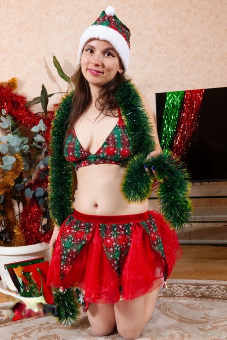 Amateur Tais Mersedes unveils her big tits & masturbates in a Christmas solo
