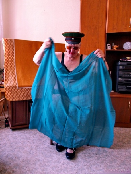 Blonde granny Grieselda shows her saggy tits while completely naked