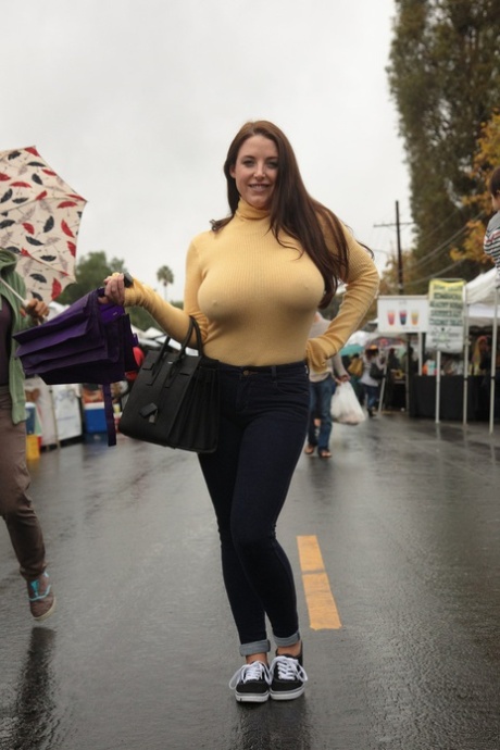 Curvaceous babe Angela White strips her bra and teases with her nips in public
